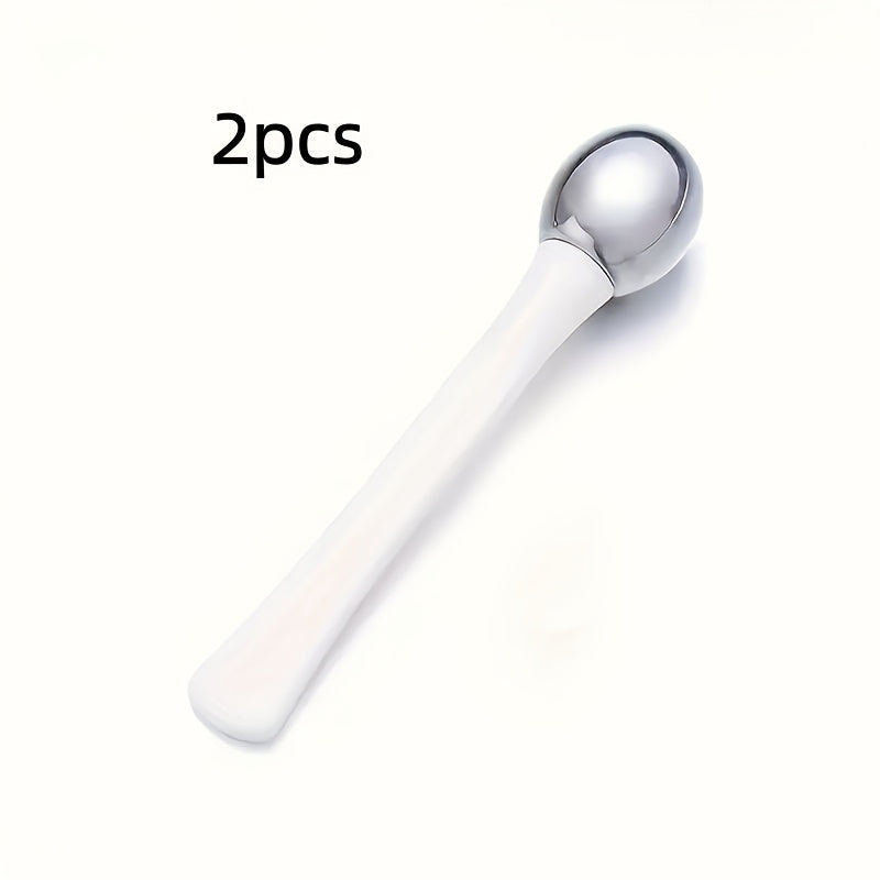 2 eye massage rollers